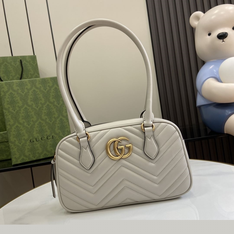 G*u*i top handle bags
